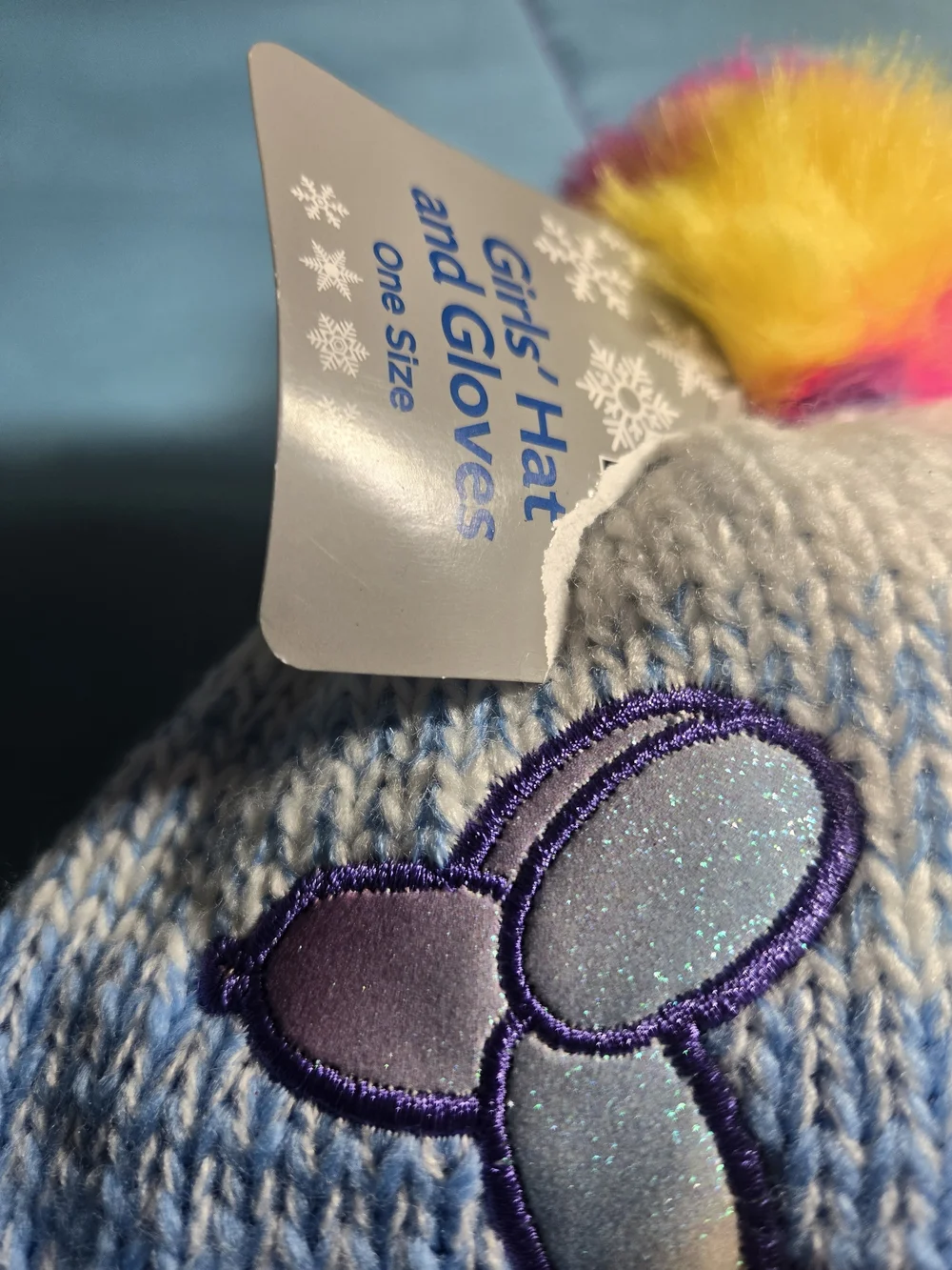 Girls' Light Blue Knit Beanie with Colorful Pom-Pom and Balloon Dog Patch